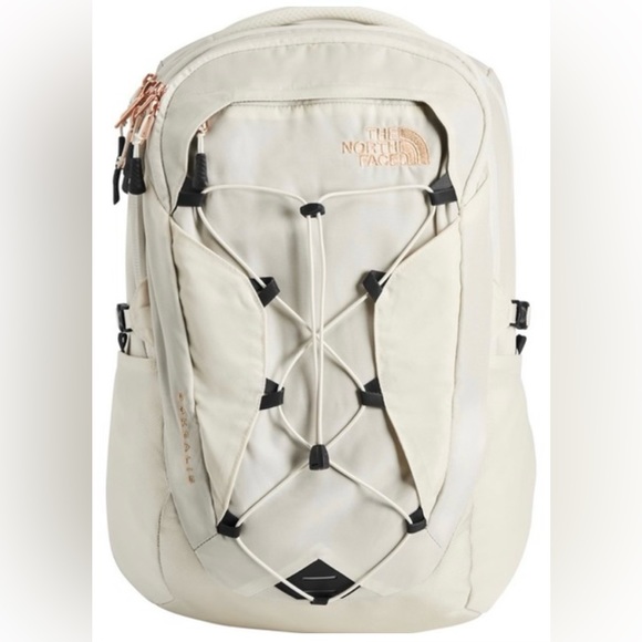 The North Face Handbags - The North Face Cream/Rose Gold Backpack